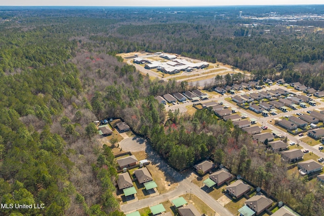 bird's eye view with a residential view and a forest view