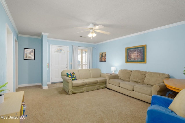 living room with carpet floors, baseboards, and ornamental molding