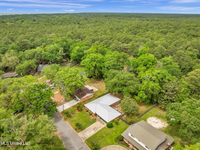 aerial view featuring a forest view