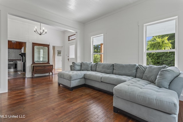 21021 Old River Rd, Vancleave, MS 39565 - living area featuring a chandelier, ornamental molding, and dark wood-style floors