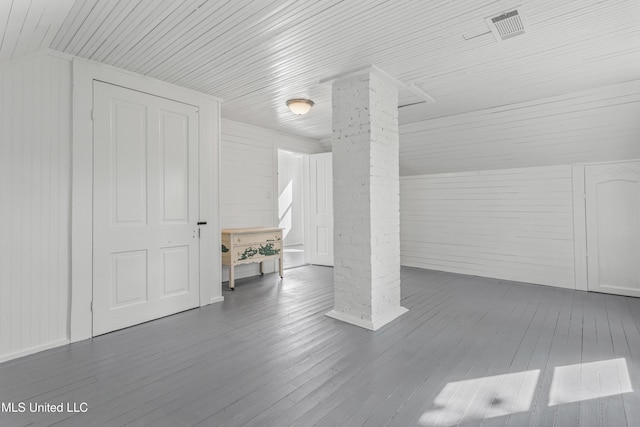21021 Old River Rd, Vancleave, MS 39565 - bonus room featuring ornate columns, wood ceiling, wood finished floors, and wooden walls