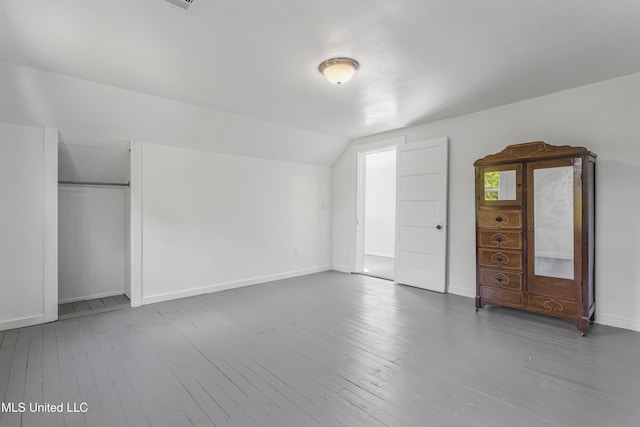 21021 Old River Rd, Vancleave, MS 39565 - bonus room with wood-type flooring, baseboards, and lofted ceiling