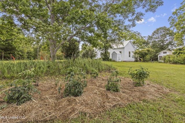 21021 Old River Rd, Vancleave, MS 39565 - view of grassy yard featuring an outbuilding