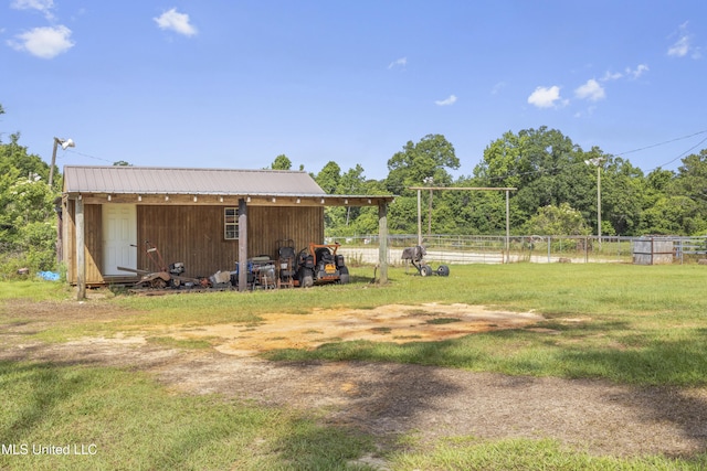 21021 Old River Rd, Vancleave, MS 39565 - view of yard with an outbuilding, a pole building, and a carport