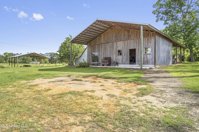 21021 Old River Rd, Vancleave, MS 39565 - view of outdoor structure featuring a detached carport