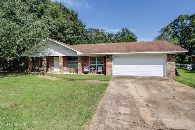 ranch-style home with a porch, a front yard, and a garage