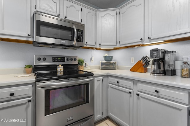 13625 Mount Pleasant Rd, Vancleave, MS 39565 - kitchen with appliances with stainless steel finishes and light countertops