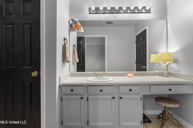 13625 Mount Pleasant Rd, Vancleave, MS 39565 - bathroom with tile patterned floors and vanity