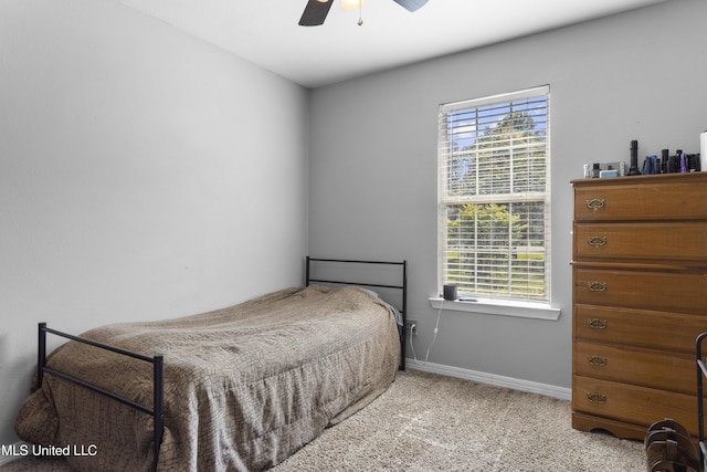 13625 Mount Pleasant Rd, Vancleave, MS 39565 - bedroom featuring multiple windows, carpet floors, and a ceiling fan