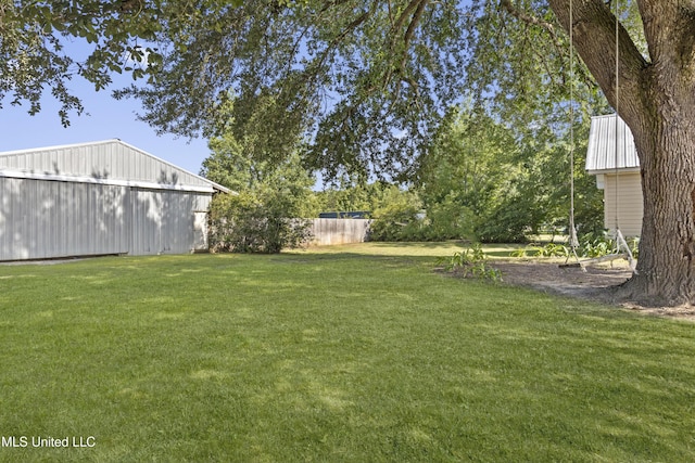 13625 Mount Pleasant Rd, Vancleave, MS 39565 - view of yard featuring a pole building, an outbuilding, and a detached garage