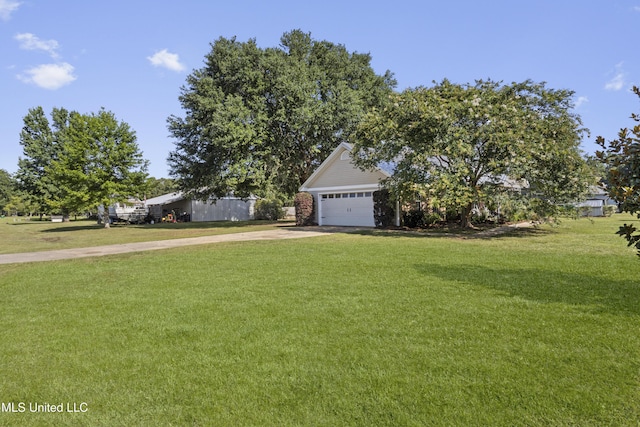 13625 Mount Pleasant Rd, Vancleave, MS 39565 - view of front of property featuring driveway, a front yard, and an attached garage