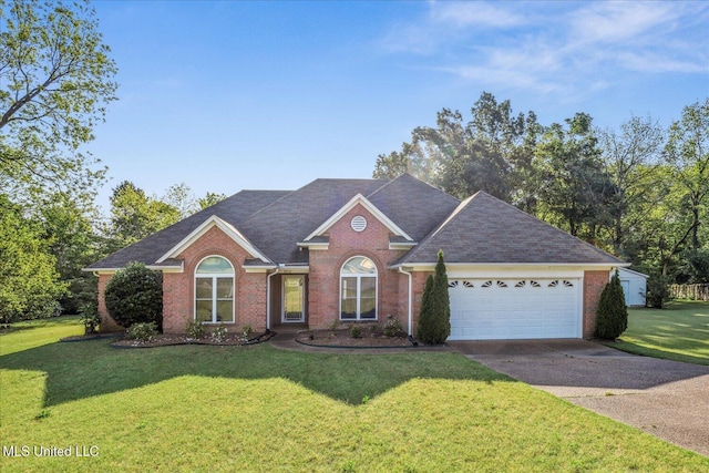 view of front facade featuring brick siding, an attached garage, driveway, and a front lawn