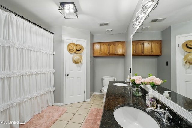 full bathroom featuring tile patterned flooring, visible vents, toilet, and a sink