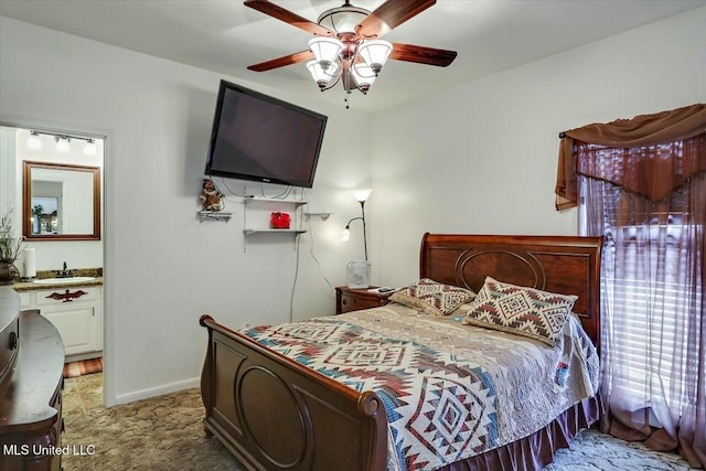 carpeted bedroom featuring sink and ceiling fan