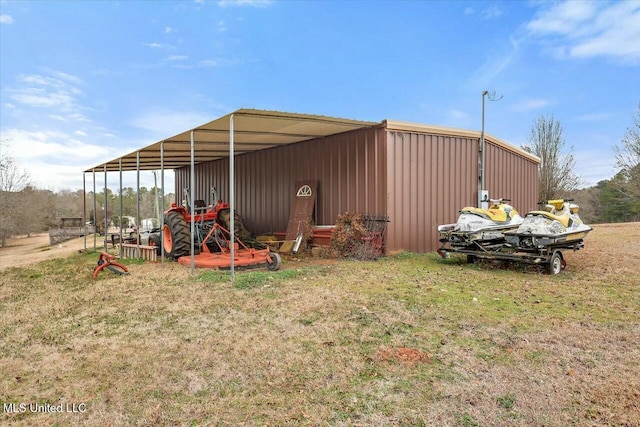 view of outdoor structure featuring a yard