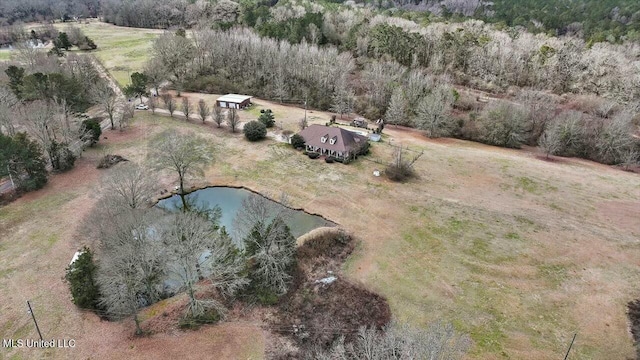 birds eye view of property with a water view and a rural view