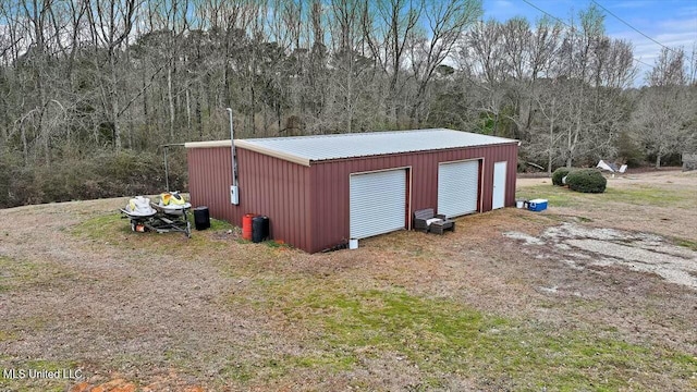 view of outbuilding featuring a garage