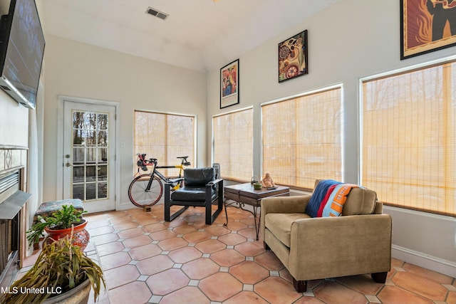 sunroom with vaulted ceiling