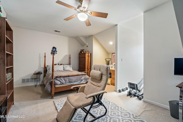 bedroom featuring ceiling fan, light colored carpet, and vaulted ceiling