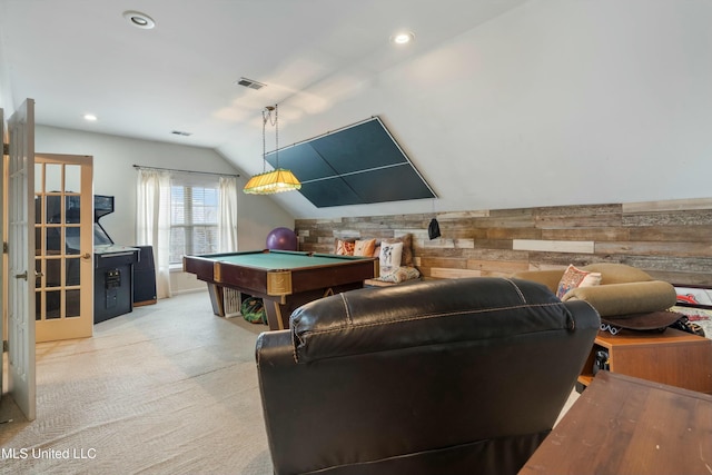 rec room with lofted ceiling, billiards, and wood walls