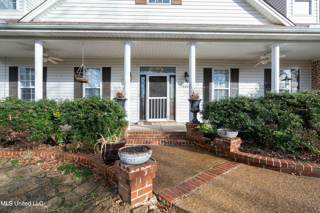 doorway to property featuring ceiling fan and a porch