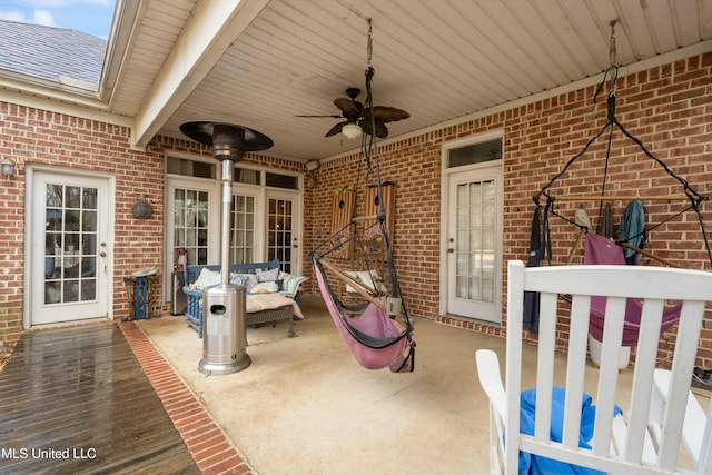 view of patio featuring a wooden deck and ceiling fan