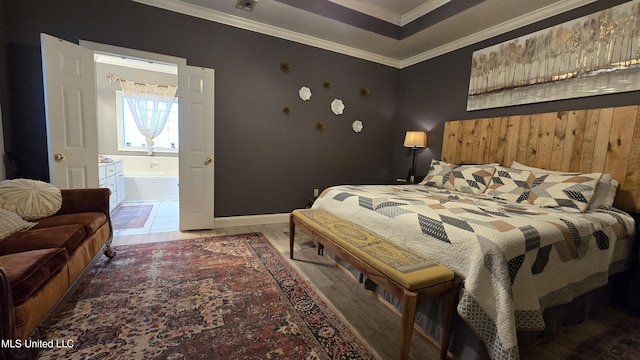312 Grandview Ct, Pearl, MS 39208 - bedroom with ornamental molding, wood finished floors, baseboards, and connected bathroom