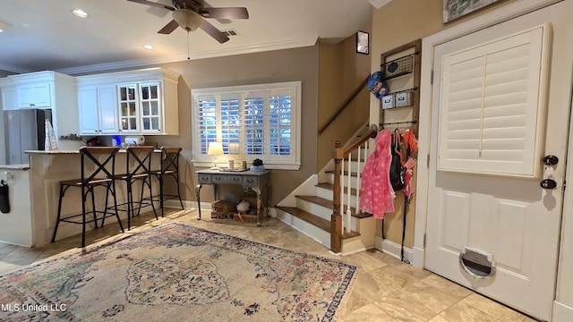 312 Grandview Ct, Pearl, MS 39208 - foyer featuring a ceiling fan, stairway, crown molding, baseboards, and recessed lighting