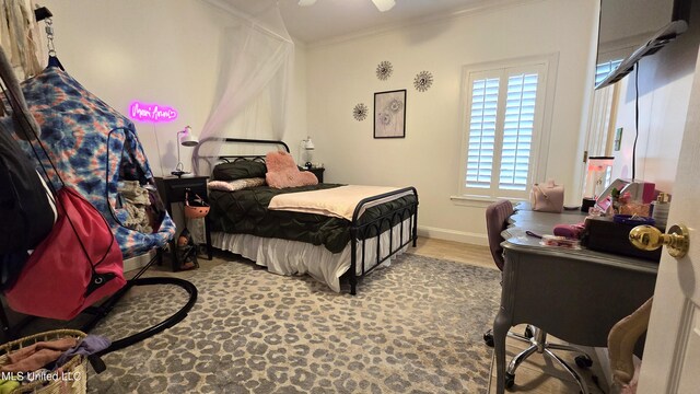 312 Grandview Ct, Pearl, MS 39208 - bedroom featuring ornamental molding, baseboards, and wood finished floors