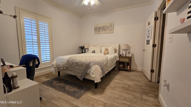 312 Grandview Ct, Pearl, MS 39208 - bedroom with crown molding, wood finished floors, baseboards, and a ceiling fan