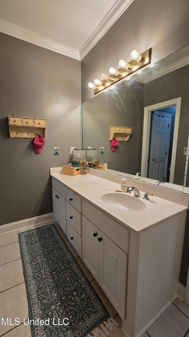 312 Grandview Ct, Pearl, MS 39208 - bathroom with crown molding, vanity, tile patterned flooring, and baseboards