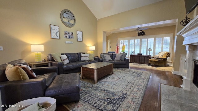312 Grandview Ct, Pearl, MS 39208 - living area featuring ceiling fan, wood finished floors, a fireplace, and high vaulted ceiling
