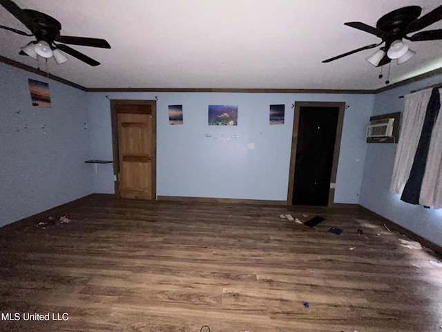 99 SW Railroad Rd, Roxie, MS 39661 - spare room with ceiling fan, ornamental molding, wood finished floors, and an AC wall unit