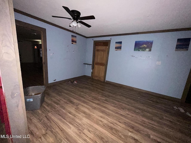 99 SW Railroad Rd, Roxie, MS 39661 - unfurnished room with crown molding, wood finished floors, and ceiling fan
