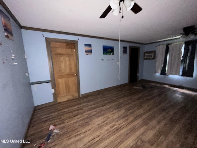 99 SW Railroad Rd, Roxie, MS 39661 - spare room with crown molding, wood finished floors, and ceiling fan