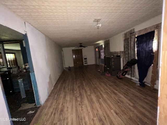 99 SW Railroad Rd, Roxie, MS 39661 - unfurnished living room with wood finished floors and ceiling fan