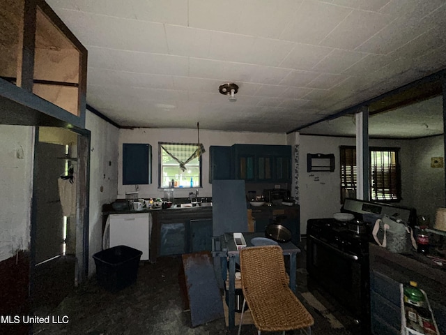 99 SW Railroad Rd, Roxie, MS 39661 - kitchen featuring black range with gas cooktop, dark countertops, and dishwasher