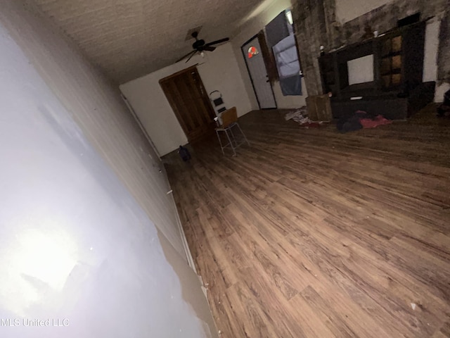 99 SW Railroad Rd, Roxie, MS 39661 - living area with wood finished floors and ceiling fan