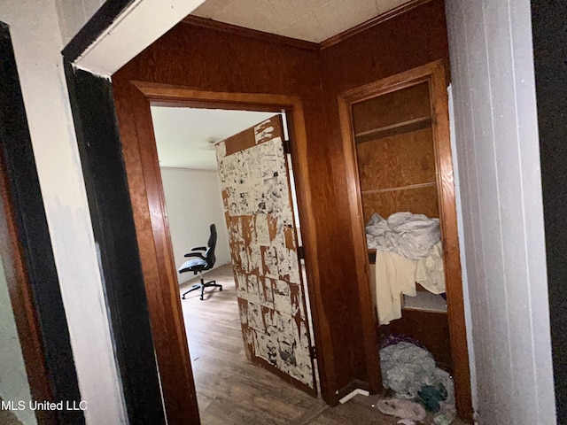 99 SW Railroad Rd, Roxie, MS 39661 - hall featuring ornamental molding, wood finished floors, and a desk