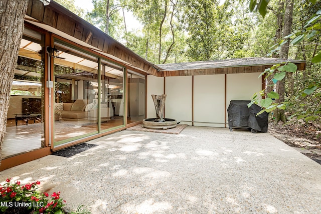 view of patio / terrace featuring a grill