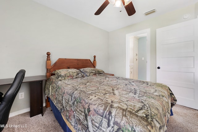 bedroom featuring light colored carpet and ceiling fan