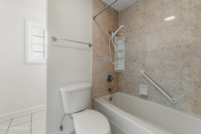 bathroom featuring toilet, tile patterned flooring, and tub / shower combination