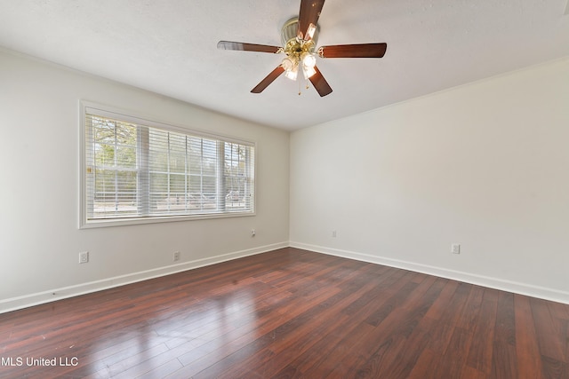 unfurnished room featuring ceiling fan and dark hardwood / wood-style floors