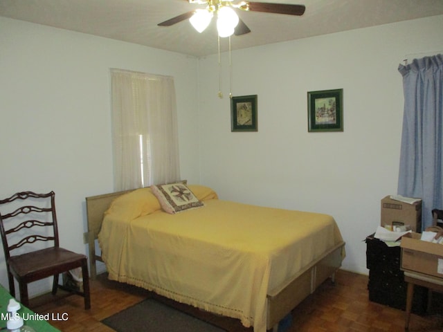 bedroom featuring ceiling fan