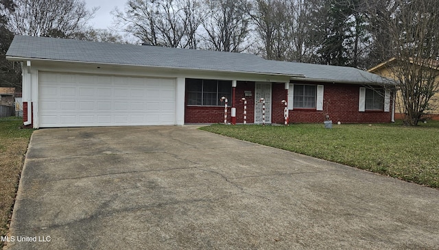 ranch-style home featuring a garage and a front lawn