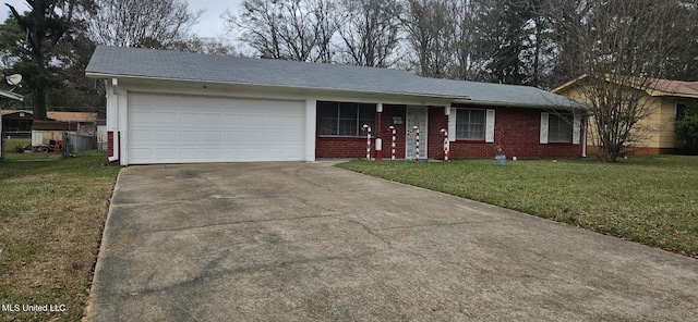 single story home with a garage and a front lawn