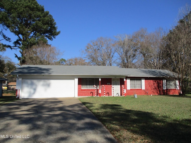 ranch-style home with a front lawn and a garage