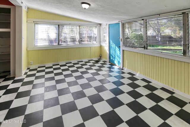 302 Decelle St, Jackson, MS 39216 - unfurnished sunroom with lofted ceiling