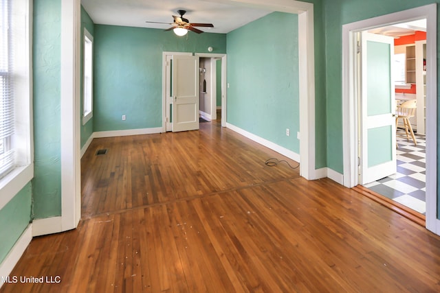302 Decelle St, Jackson, MS 39216 - spare room with ceiling fan, healthy amount of natural light, and hardwood / wood-style floors