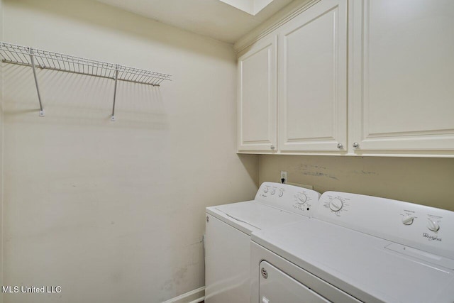 103 Cavitt Cv, Clinton, MS 39056 - washroom featuring separate washer and dryer and cabinet space